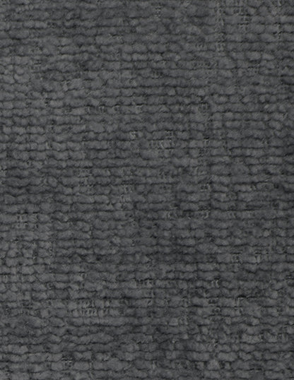 Detalle de textura en tela gris de sofá tipo tejido suave