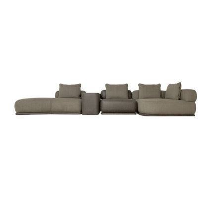 Sala modular contemporánea con chaise longue y cojines en tonos neutros