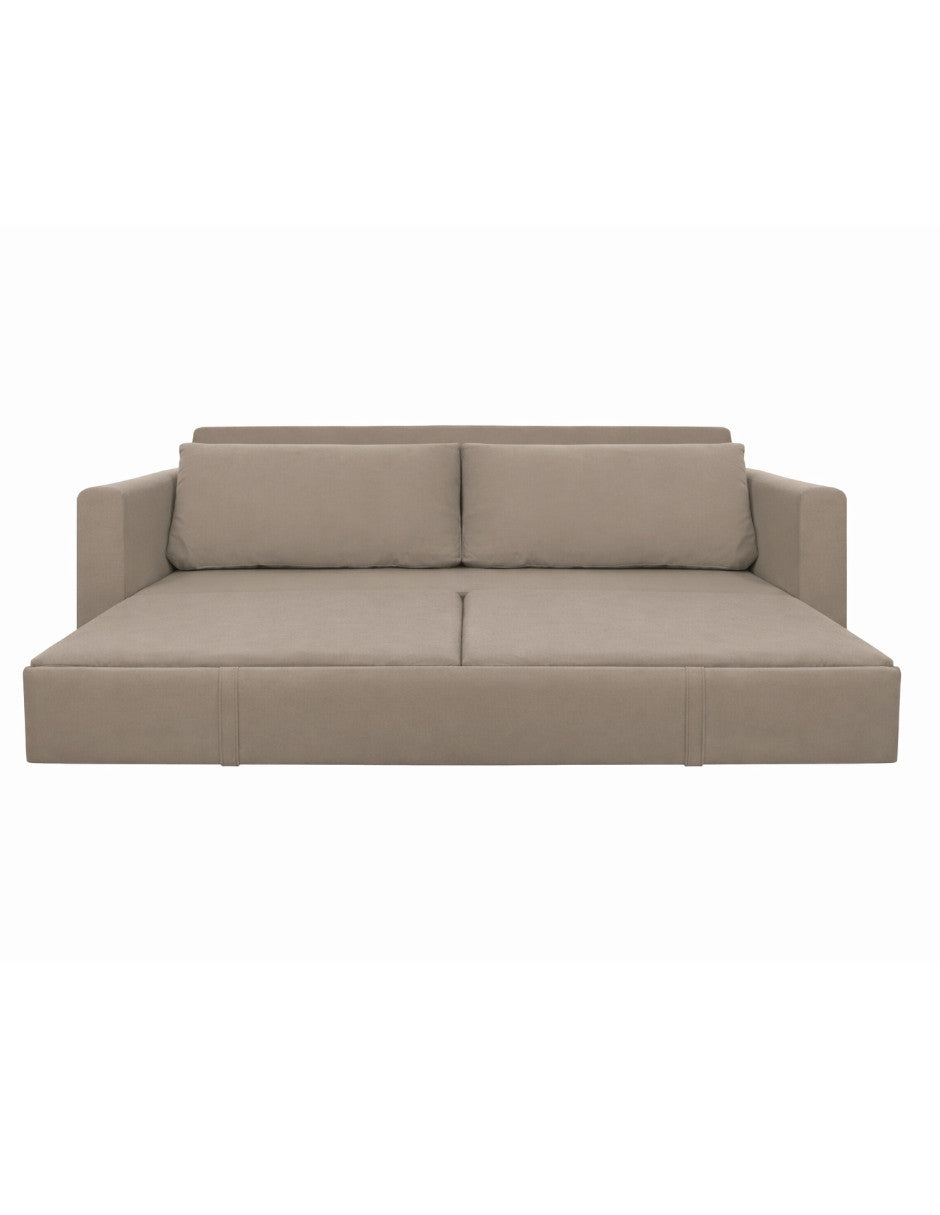 Sofá cama desplegado en color beige convertido en cama, ideal para espacios pequeños y multifuncionales