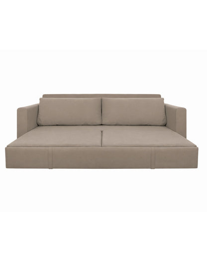 Sofá cama desplegado en color beige convertido en cama, ideal para espacios pequeños y multifuncionales